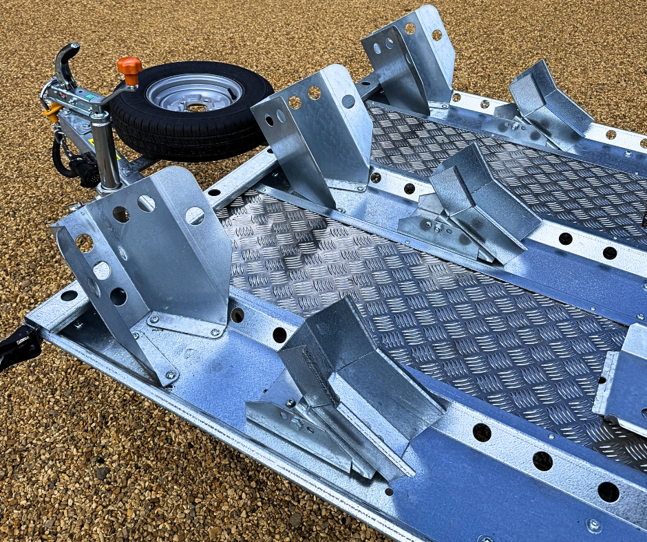 motorbike trailer wheel clamps of Woodford 3 bike triple motorbike trailer for hire and rent from Hampshire Trailer co